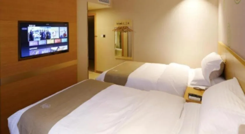 Bed in GreenTree Inn Shandong Heze Caoxian Zhuangzhai Town Oriental Times City Business Hotel