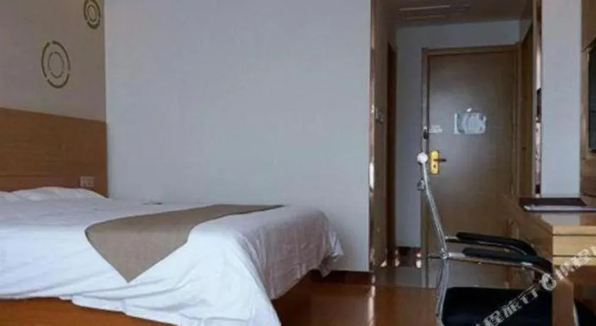 Bed in GreenTree Inn Shandong Heze Caoxian Zhuangzhai Town Oriental Times City Business Hotel