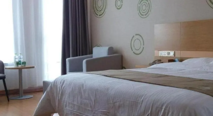 Bed in GreenTree Inn Shandong Heze Caoxian Zhuangzhai Town Oriental Times City Business Hotel