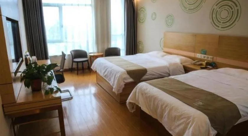 Bed in GreenTree Inn Shandong Heze Caoxian Zhuangzhai Town Oriental Times City Business Hotel