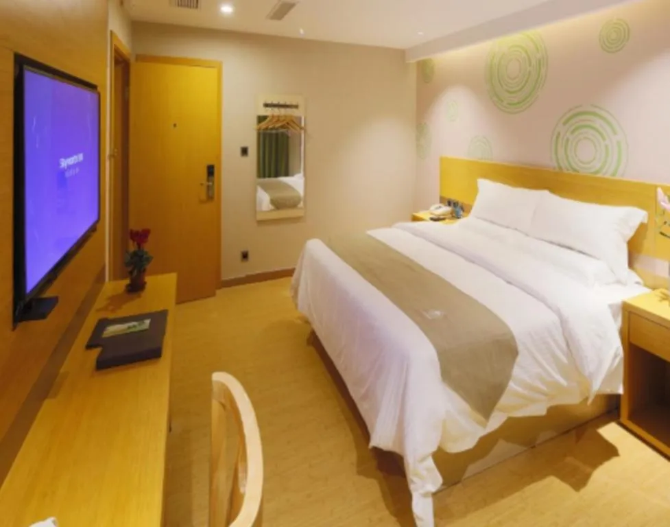 Bed in GreenTree Inn Shandong Heze Caoxian Zhuangzhai Town Oriental Times City Business Hotel