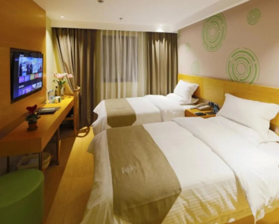 Bed in GreenTree Inn Shandong Heze Caoxian Zhuangzhai Town Oriental Times City Business Hotel