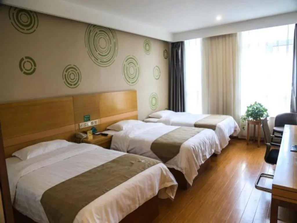Bed in GreenTree Inn Shandong Heze Caoxian Zhuangzhai Town Oriental Times City Business Hotel