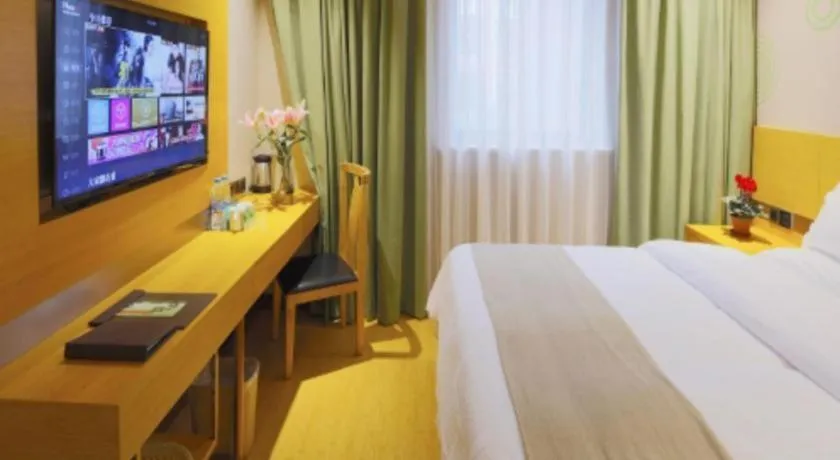 Bed in GreenTree Inn Shandong Heze Caoxian Zhuangzhai Town Oriental Times City Business Hotel