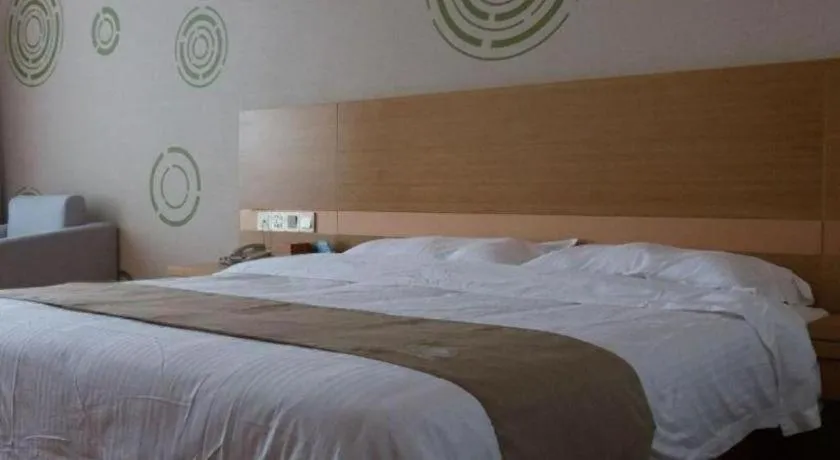 Bed in GreenTree Inn Shandong Heze Caoxian Zhuangzhai Town Oriental Times City Business Hotel
