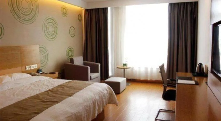 Bed in GreenTree Inn Shandong Heze Caoxian Zhuangzhai Town Oriental Times City Business Hotel