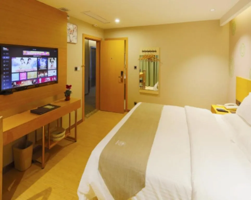 Bed in GreenTree Inn Shandong Heze Caoxian Zhuangzhai Town Oriental Times City Business Hotel