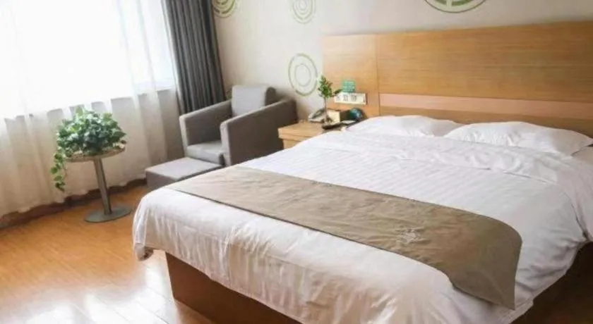 Bed in GreenTree Inn Shandong Heze Caoxian Zhuangzhai Town Oriental Times City Business Hotel