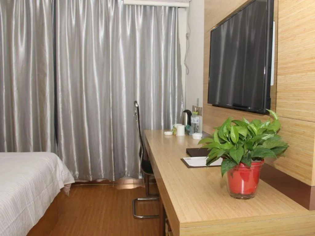 Bed in GreenTree Inn Binzhou Wudi County Yinzuo Plaza Express Hotel