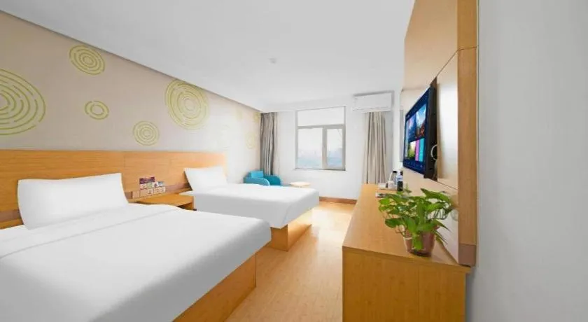 Bed in GreenTree Inn Binzhou Wudi County Yinzuo Plaza Express Hotel