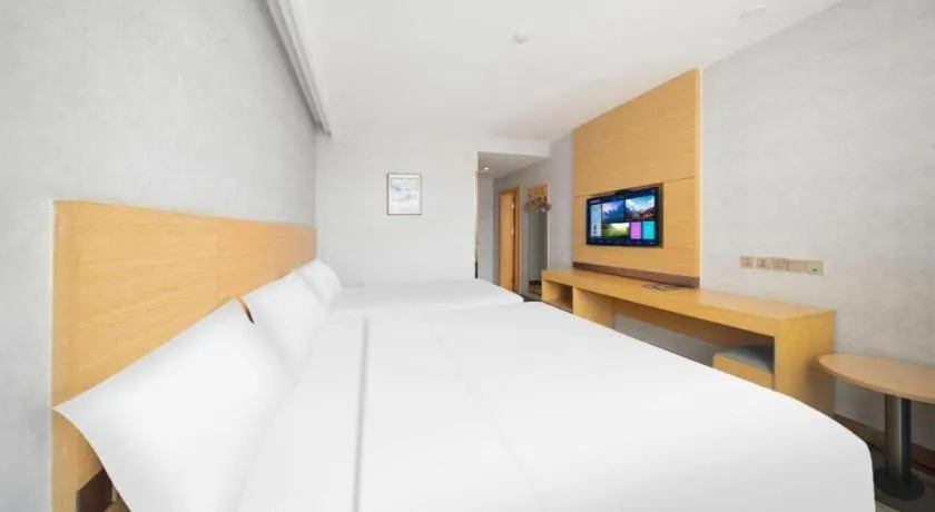 Bed in GreenTree Inn Binzhou Wudi County Yinzuo Plaza Express Hotel