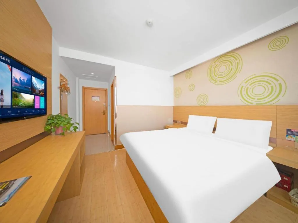 Bed in GreenTree Inn Binzhou Wudi County Yinzuo Plaza Express Hotel