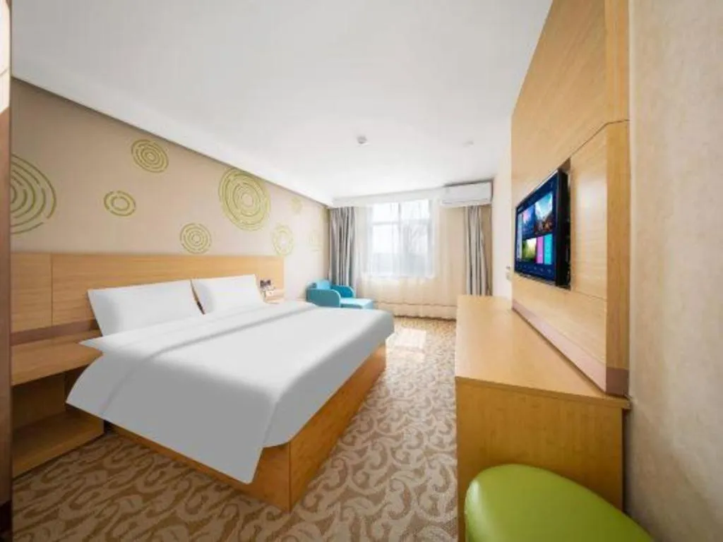 Bed in GreenTree Inn Binzhou Wudi County Yinzuo Plaza Express Hotel