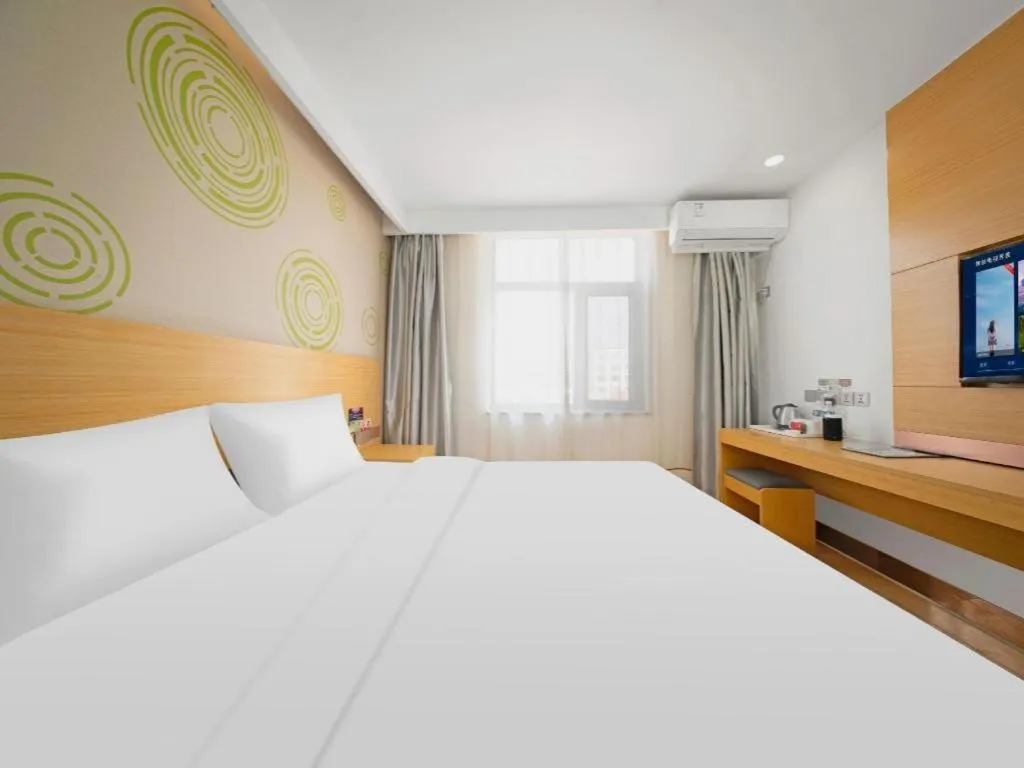 Bed in GreenTree Inn Binzhou Wudi County Yinzuo Plaza Express Hotel