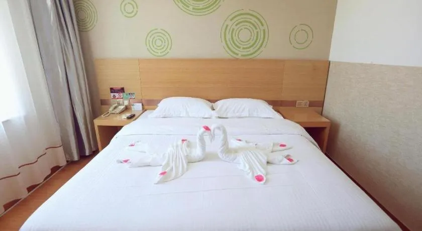 Bed in GreenTree Inn Binzhou Wudi County Yinzuo Plaza Express Hotel
