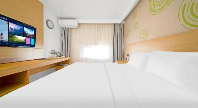 Bed in GreenTree Inn Binzhou Wudi County Yinzuo Plaza Express Hotel