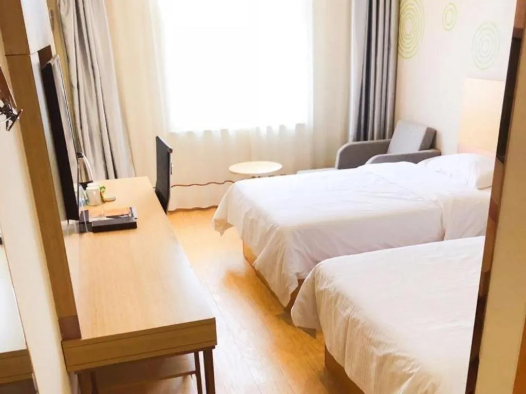 Bed in GreenTree Inn Binzhou Wudi County Yinzuo Plaza Express Hotel