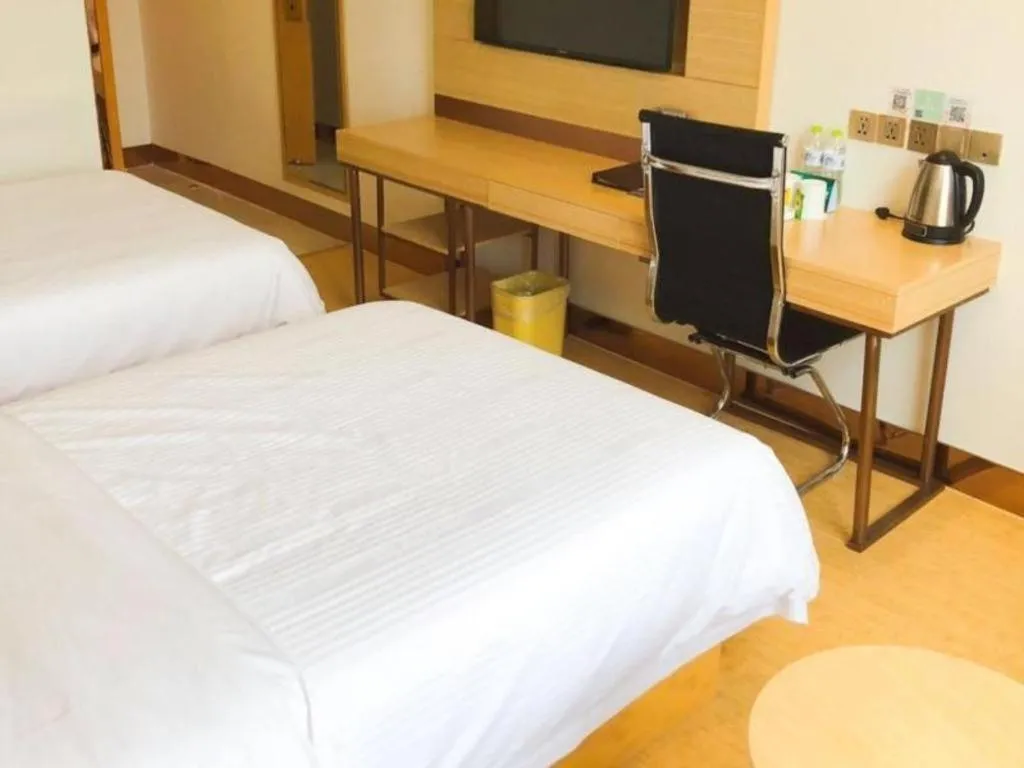 Bed in GreenTree Inn Binzhou Wudi County Yinzuo Plaza Express Hotel