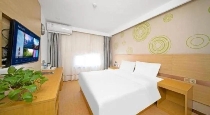 Bed in GreenTree Inn Binzhou Wudi County Yinzuo Plaza Express Hotel