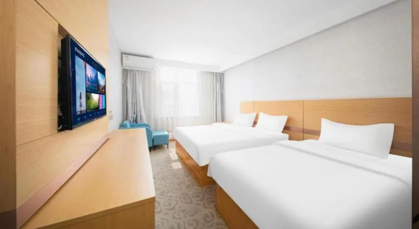 Bed in GreenTree Inn Binzhou Wudi County Yinzuo Plaza Express Hotel