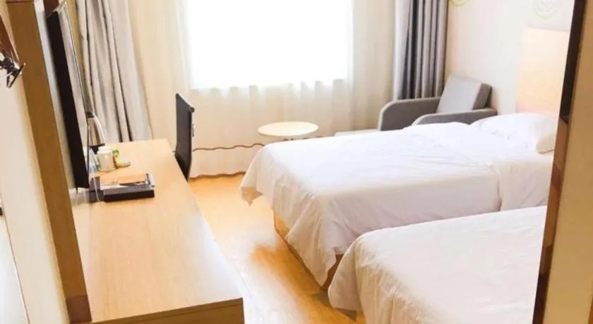 Bed in GreenTree Inn Binzhou Wudi County Yinzuo Plaza Express Hotel