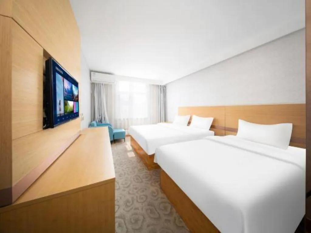 Bed in GreenTree Inn Binzhou Wudi County Yinzuo Plaza Express Hotel