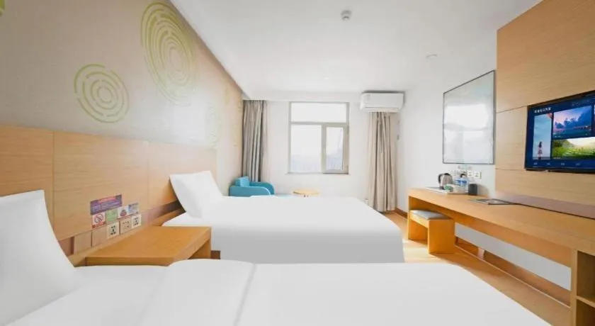 Bed in GreenTree Inn Binzhou Wudi County Yinzuo Plaza Express Hotel
