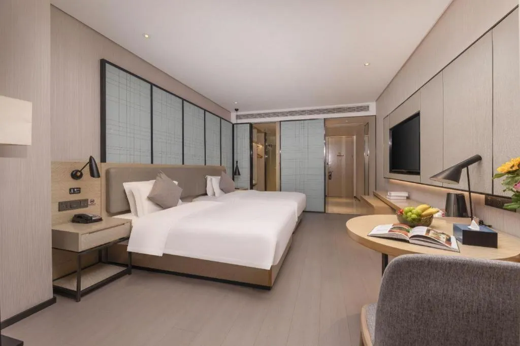 Bed in Echarm Hotel Wuxi Zhongnan Road Ancient Canal