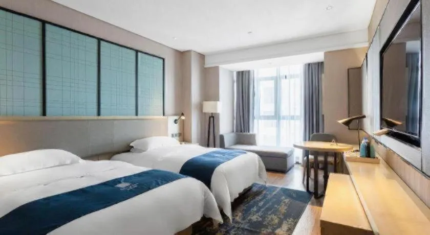 Bed in Echarm Hotel Wuxi Zhongnan Road Ancient Canal