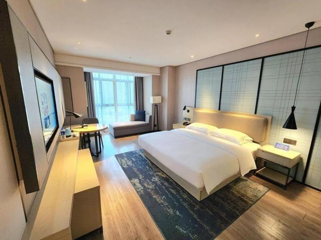 Bed in Echarm Hotel Wuxi Zhongnan Road Ancient Canal