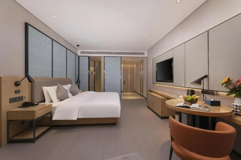 Bed in Echarm Hotel Wuxi Zhongnan Road Ancient Canal