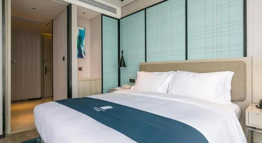 Bed in Echarm Hotel Wuxi Zhongnan Road Ancient Canal