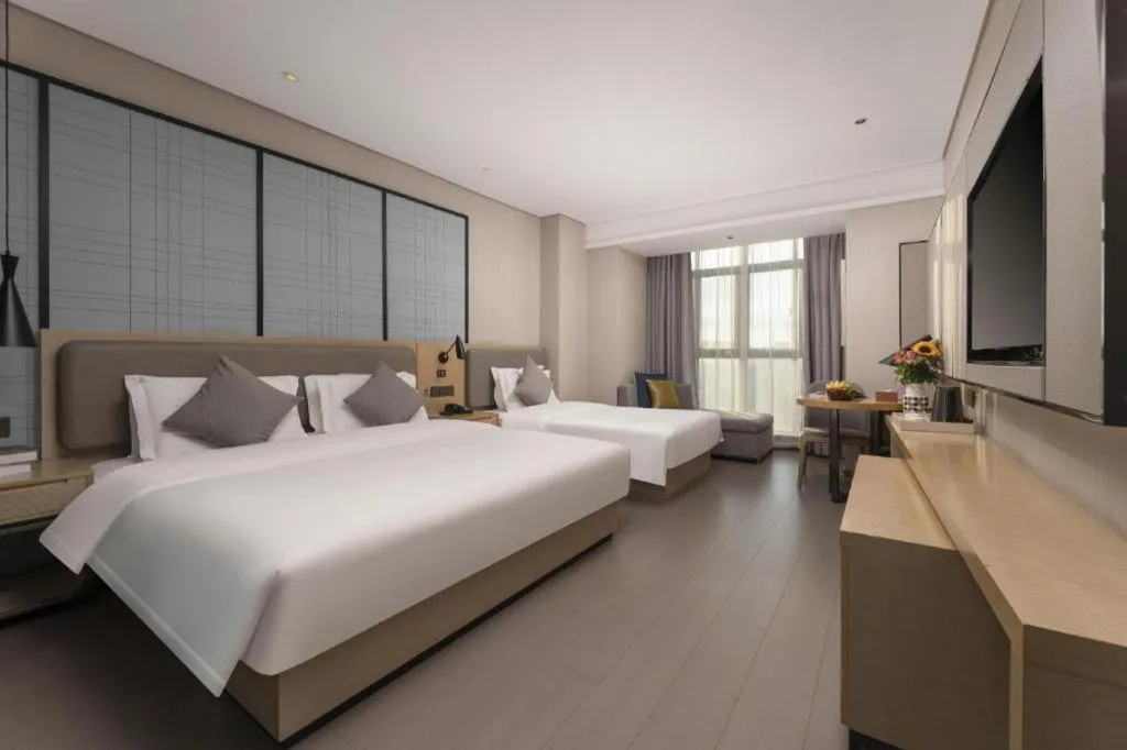 Bed in Echarm Hotel Wuxi Zhongnan Road Ancient Canal