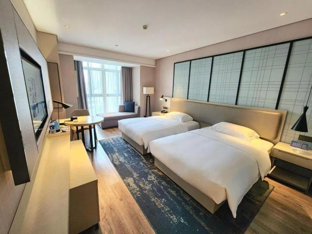 Bed in Echarm Hotel Wuxi Zhongnan Road Ancient Canal