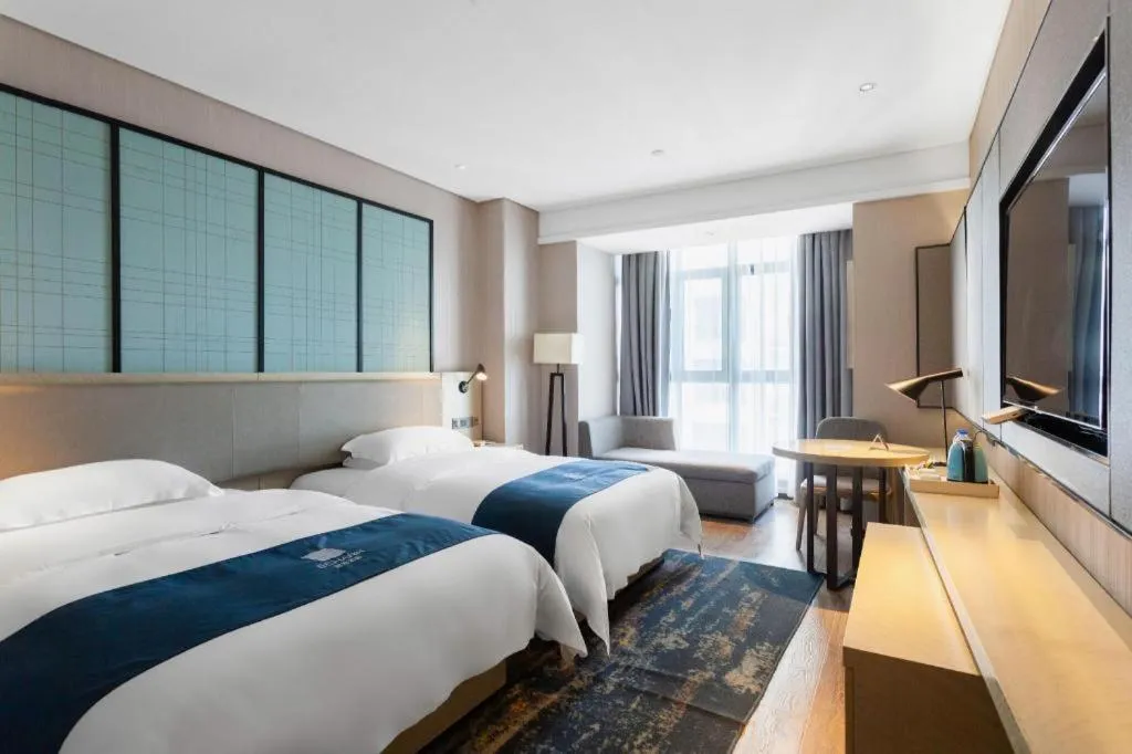 Bed in Echarm Hotel Wuxi Zhongnan Road Ancient Canal