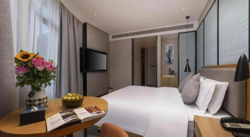 Bed in Echarm Hotel Wuxi Zhongnan Road Ancient Canal