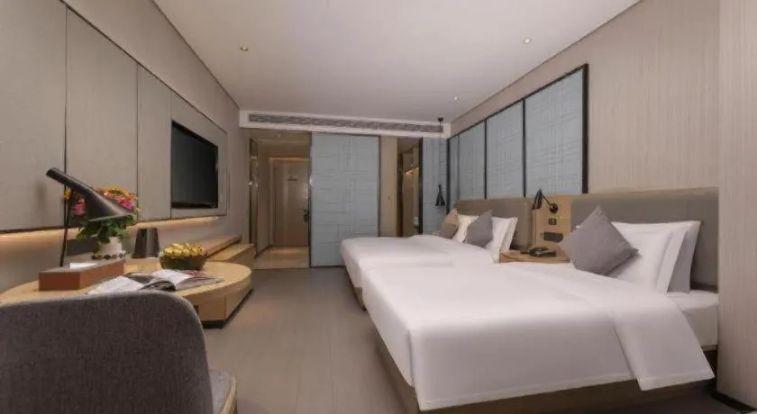 Bed in Echarm Hotel Wuxi Zhongnan Road Ancient Canal