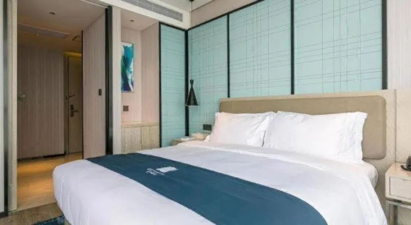 Bed in Echarm Hotel Wuxi Zhongnan Road Ancient Canal
