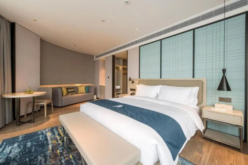 Bed in Echarm Hotel Wuxi Zhongnan Road Ancient Canal