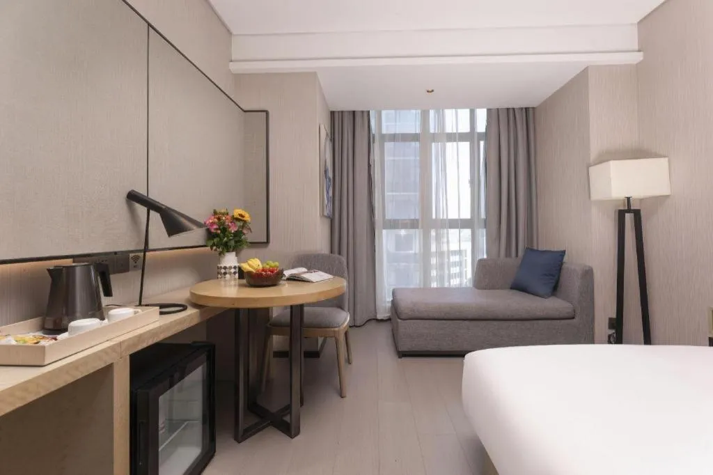 Bed in Echarm Hotel Wuxi Zhongnan Road Ancient Canal