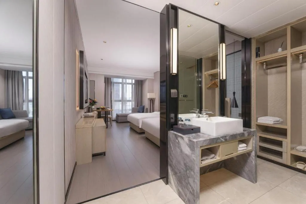 Bed in Echarm Hotel Wuxi Zhongnan Road Ancient Canal