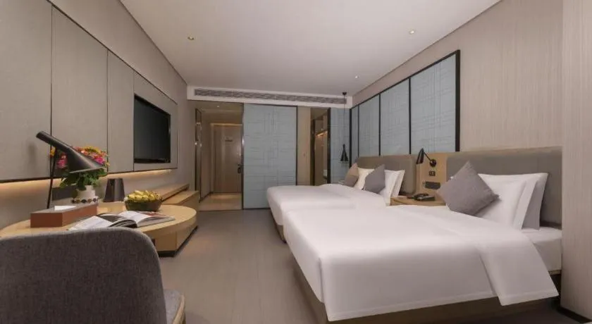 Bed in Echarm Hotel Wuxi Zhongnan Road Ancient Canal