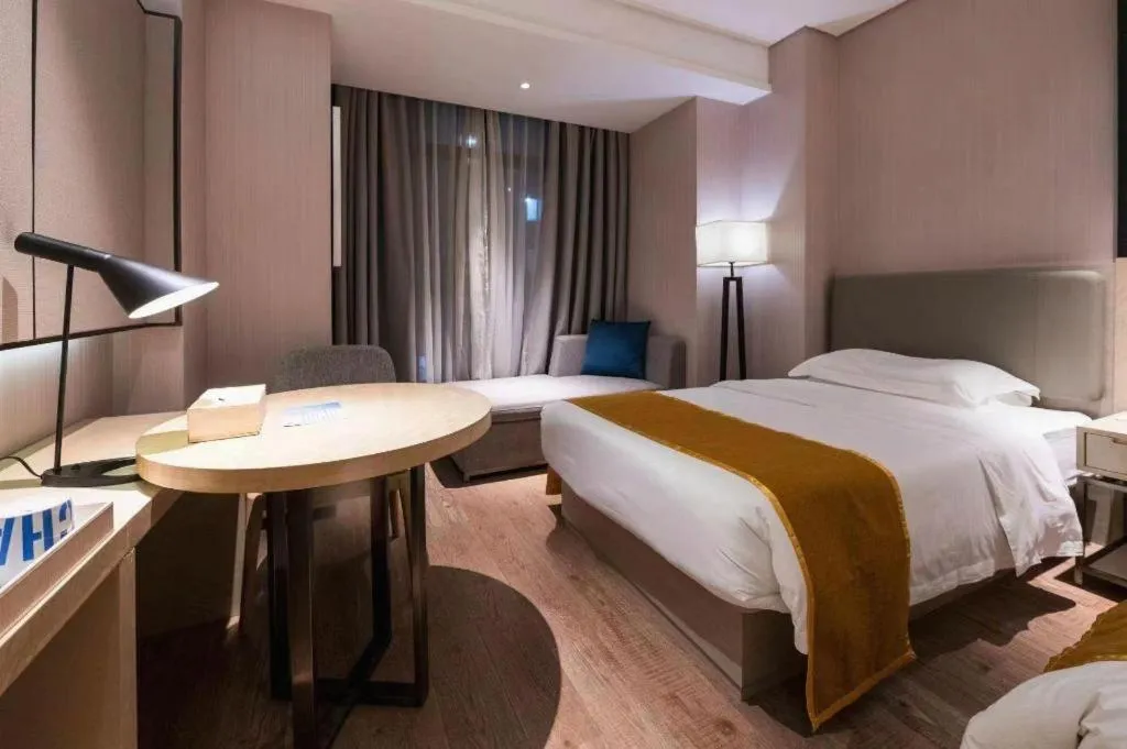 Bed in Echarm Hotel Wuxi Zhongnan Road Ancient Canal