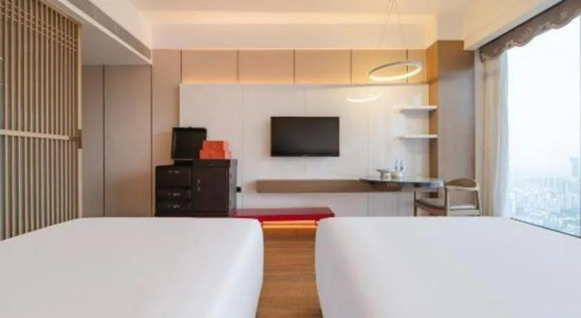 Bed in Hengding Century Hotel Chengdu