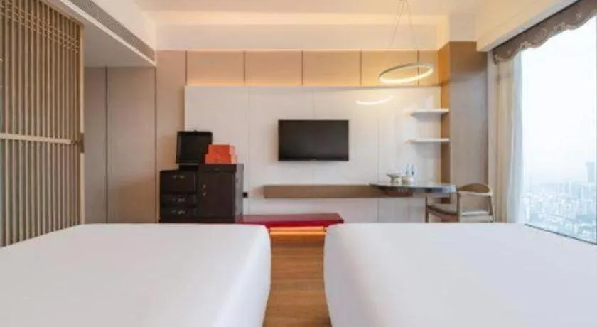 Bed in Hengding Century Hotel Chengdu