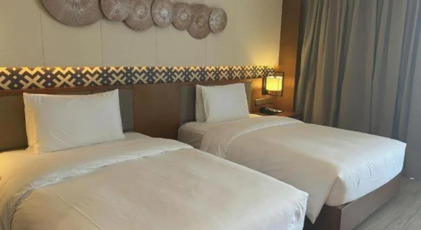 Bed in La Fountain Hotel & Resort Sanya