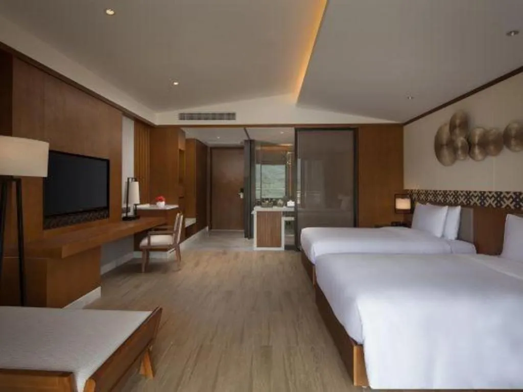 Bed in La Fountain Hotel & Resort Sanya