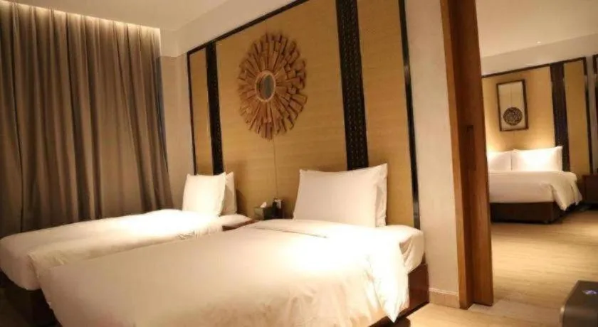 Bed in La Fountain Hotel & Resort Sanya