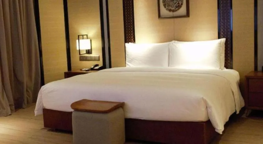 Bed in La Fountain Hotel & Resort Sanya