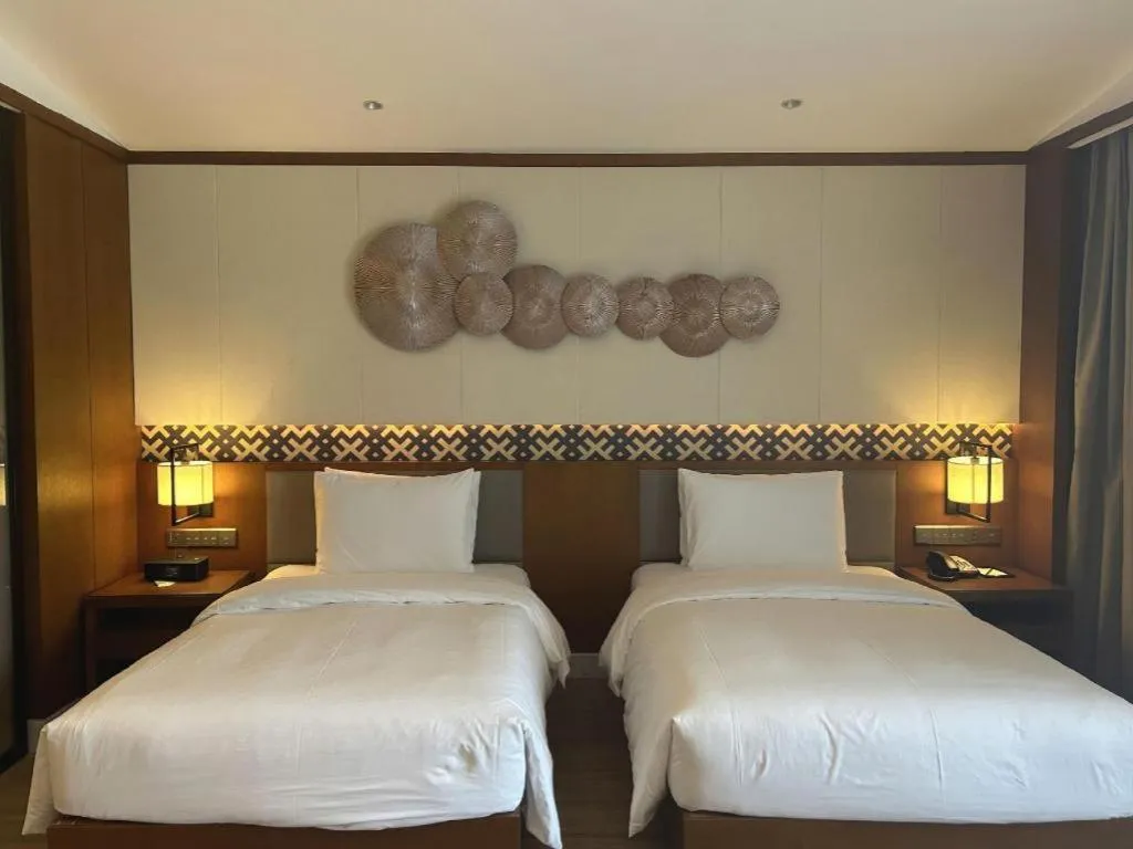 Bed in La Fountain Hotel & Resort Sanya